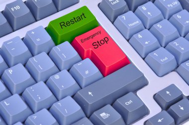 Emergency stop & restart on a computer keyboard clipart