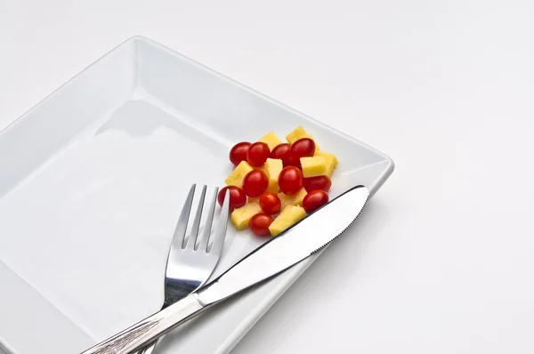 Chese et tomates dans une assiette — Photo