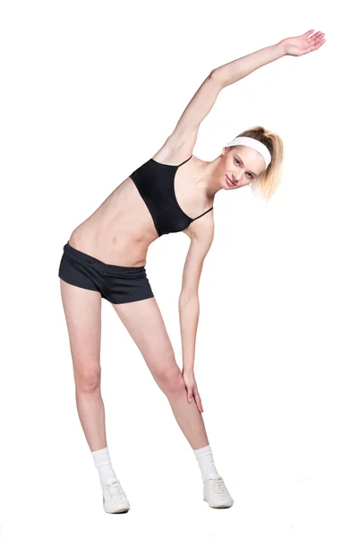 Vacker blond fitness tjej i svarta kläder. — Stockfoto