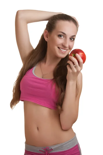 Mulher atlética com maçã — Fotografia de Stock
