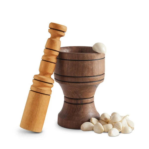 Garlic and wooden mortar — Stock Photo, Image