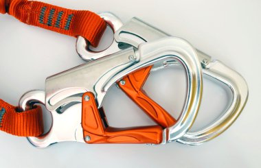 Climbing equipment - safety carabiners or quickdraws clipart