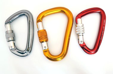 Climbing equipment - three multicolor carabiners clipart