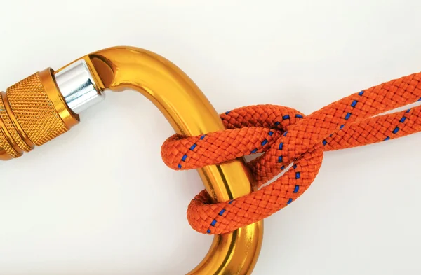 Climbing equipment - carabiner and knot — Stock Photo, Image