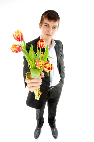 Podnikatel nabízí Tulipán — Stock fotografie