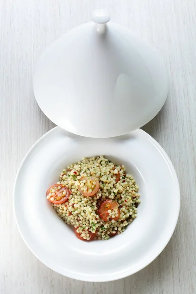 Millet in the white dish — Stock Photo, Image
