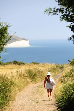 Walking near the Seven Sisters, East Sussex clipart