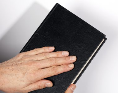 Bible with hand clipart