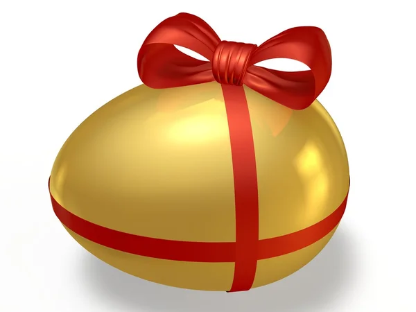 Golden egg with a bow — Stock Photo, Image