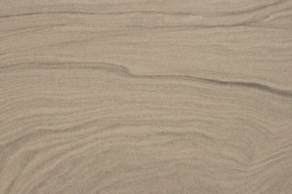 Curven in het zand — Stockfoto