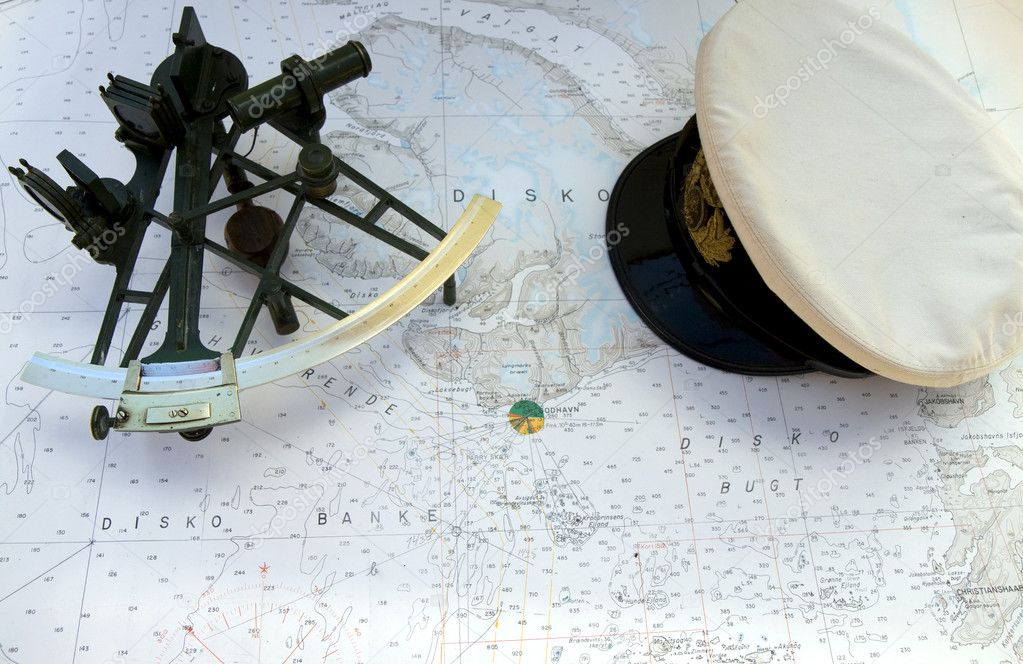 Sextant and Peaked Cap