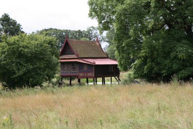 Thai House in a Danish Forest clipart