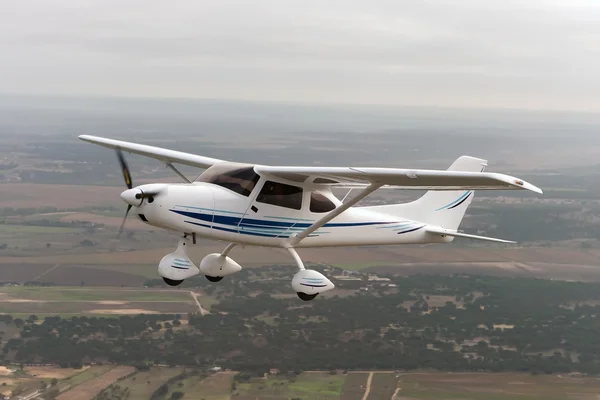 Small airplane flying — Stock Photo, Image