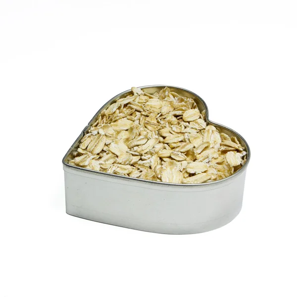 Profile of heart filled with oatmeal — Stock Photo, Image