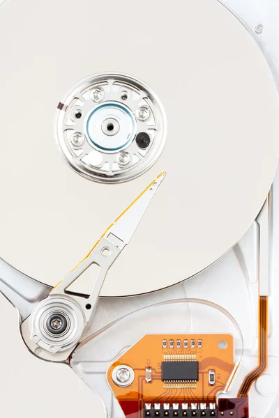 Chrome hard drive with orange ribbon — Stock Photo, Image