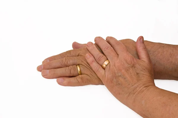 stock image Elderly couple displays wedding bands