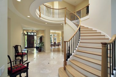 Foyer with curved staircase clipart