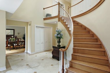 Foyer with curved staircase clipart