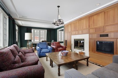 Family room with wood paneled cabinetry clipart