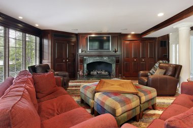 Family room with cherry wood cabinetry