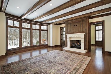 Family room with wood ceiling beams clipart