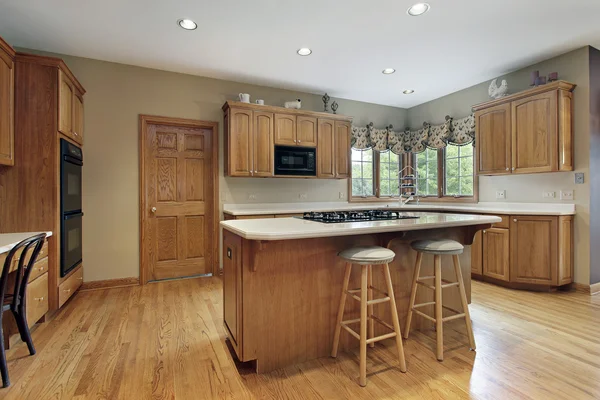 Kitchen with oak wood cabinetry — Stock Photo, Image