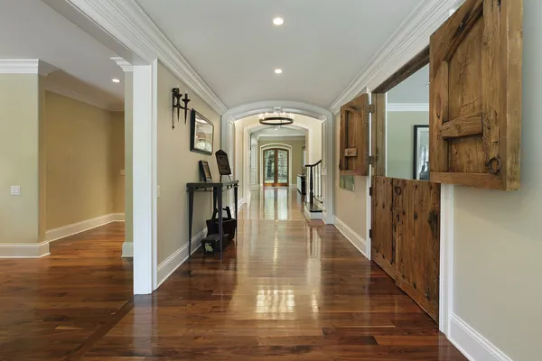 Long foyer with wooden barn doors — Stock Photo, Image