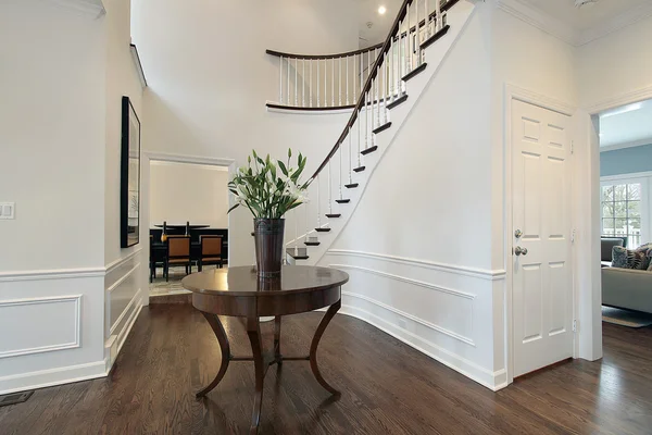 Foyer with curved staircase — Stock Photo, Image