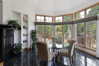 Breakfast room with wall of windows clipart