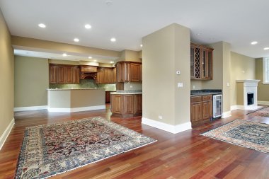 Kitchen and family room in condo clipart