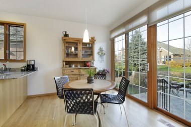 Eating area with doors to patio clipart