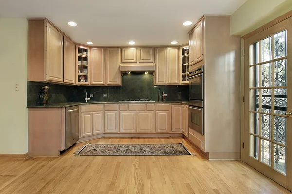 Kitchen with oak cabinetry — Stock Photo, Image