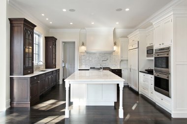 Kitchen with dark and light cabinetry clipart