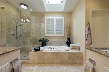 Luxury master bath with skylight clipart