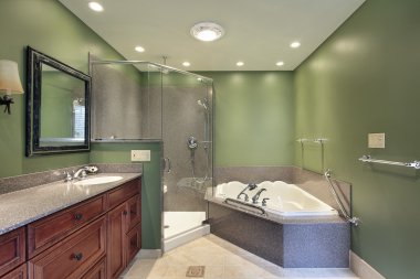 Master bath with green walls clipart