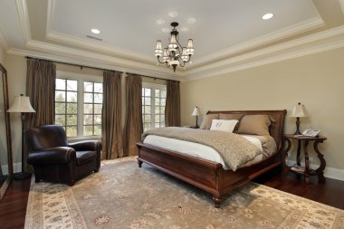 Master bedroom with tray ceiling clipart