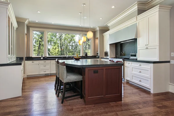 Kitchen with gray granite island — Stock Photo, Image