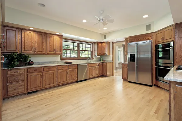 Large kitchen with wood cabinetry — Stock Photo, Image