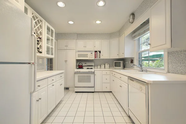 Kitchen with white cabinetry — Stock Photo, Image