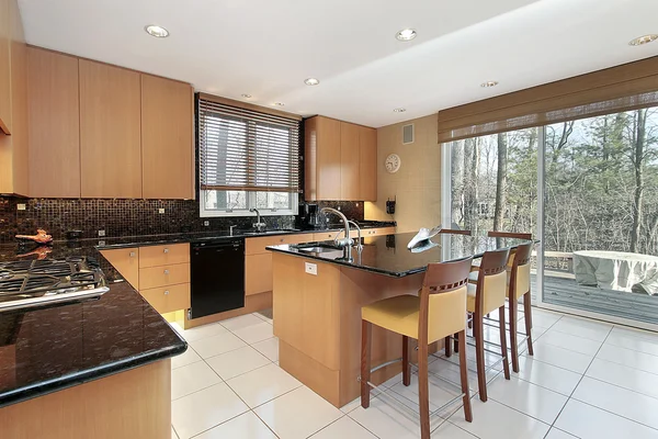 Kitchen with orange cabinetry — Stock Photo, Image