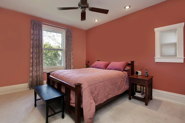 Master bedroom with peach colored walls — Stock Photo, Image