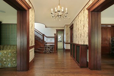 Foyer with wood paneling clipart