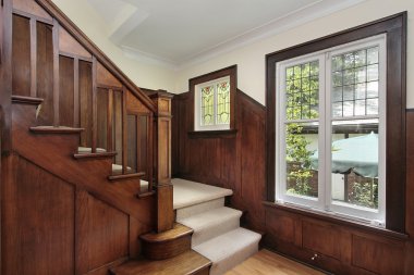 Foyer with wood paneling clipart