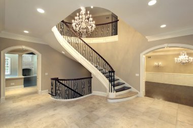 Foyer with curved stairway clipart