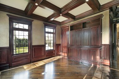 Library with cherry wood paneled walls clipart