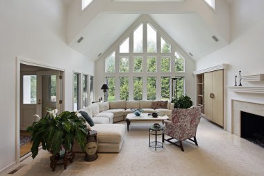 Living room with floor to ceiling windows clipart