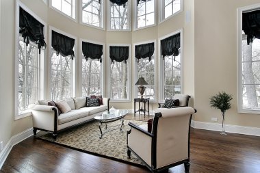 Living room with curved windows