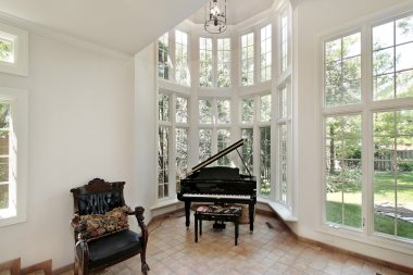 Large windowed piano room clipart