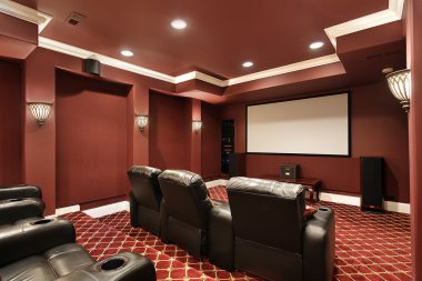 Theater room with stadium seating clipart