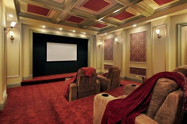 Theater with plush red carpeting clipart